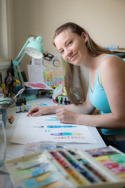 Artist printmaker working in her studio