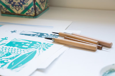 turquoise linocut and carving tools 