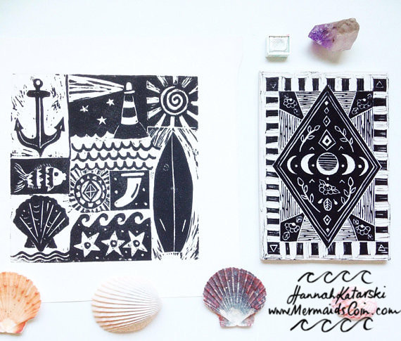 black hand printed linoprints surf art and moons
