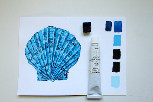 seashell painted with  blue gouache