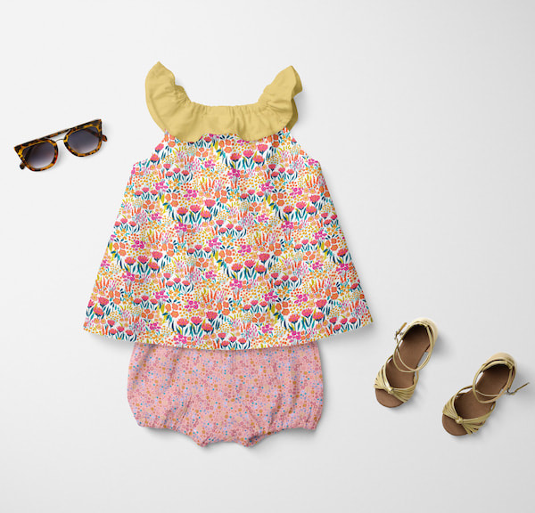 Gorgeous baby girl outfit featuring cottage floral pattern with cute sandals and sunglasses